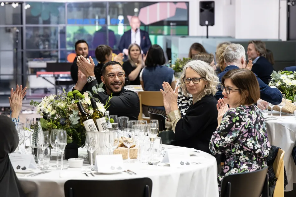 attendees at conference dinner