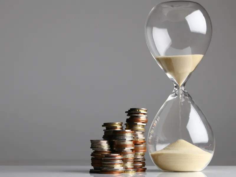 sand timer with coins