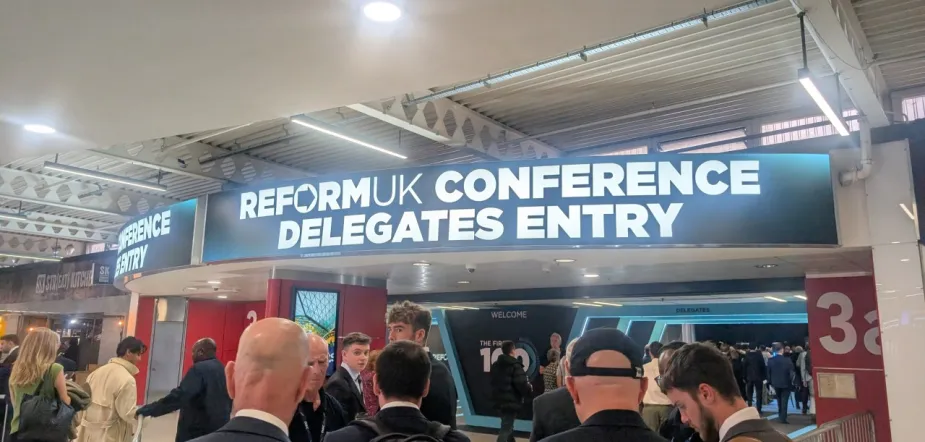 An image of a sign from Reform UK Conference reading 'delegate entry'