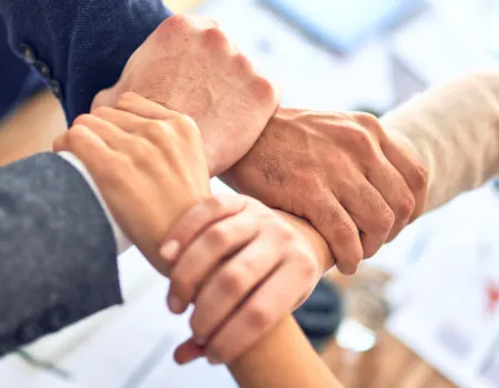 hands supporting each other