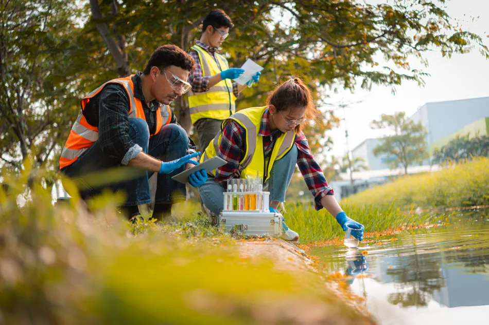 Photo of students testing water quality in the countryside